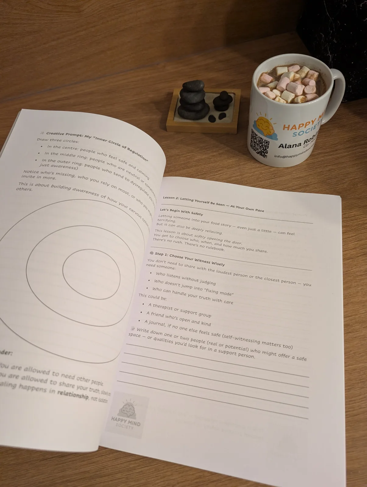 A printed Happy Mind Society reflective workbook